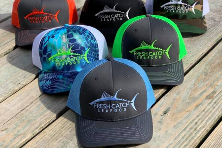 Stop by Fresh catch Seafood in Wanchese and for one of our company logo hats. 